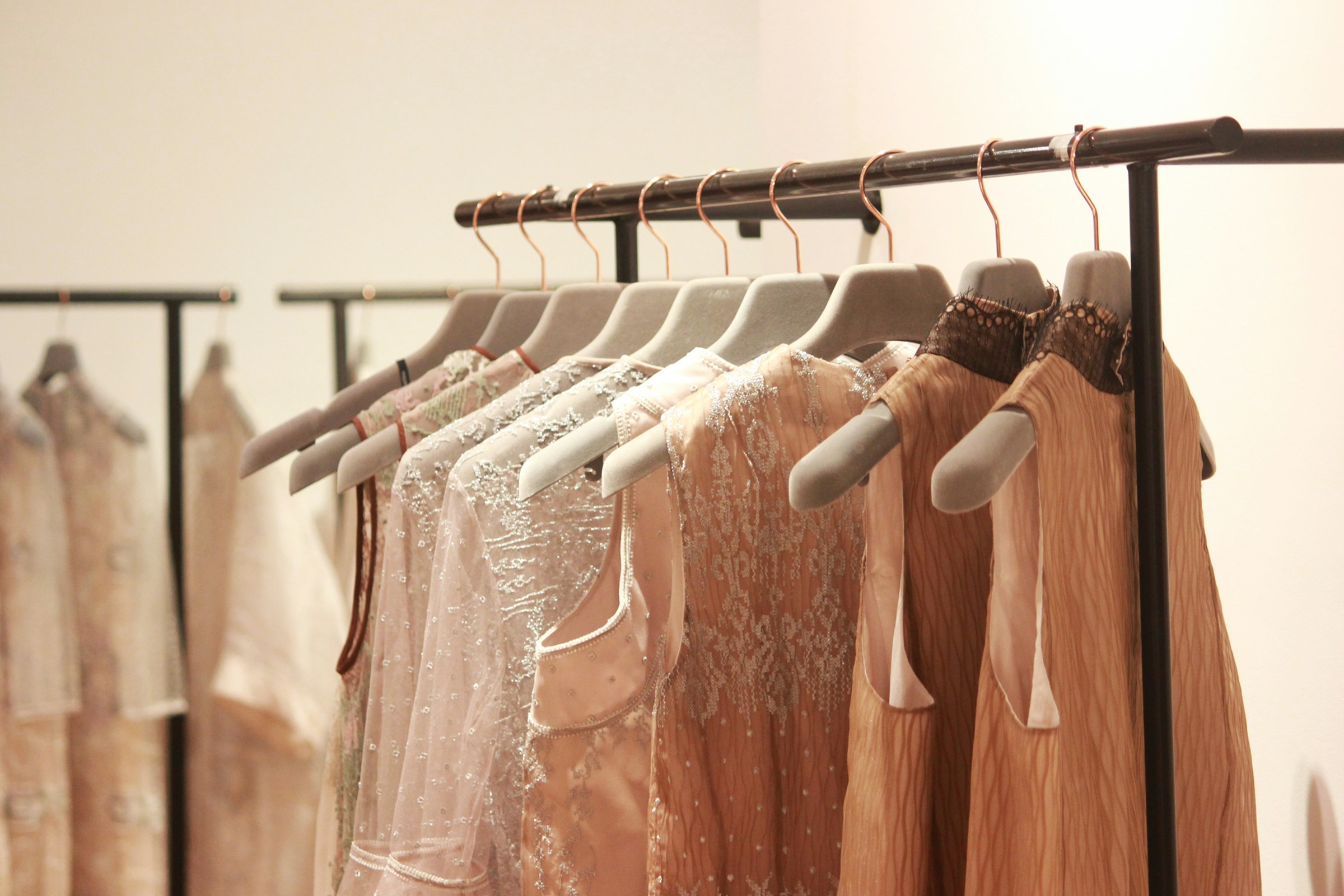 Rack of dresses in soft seasonal tones