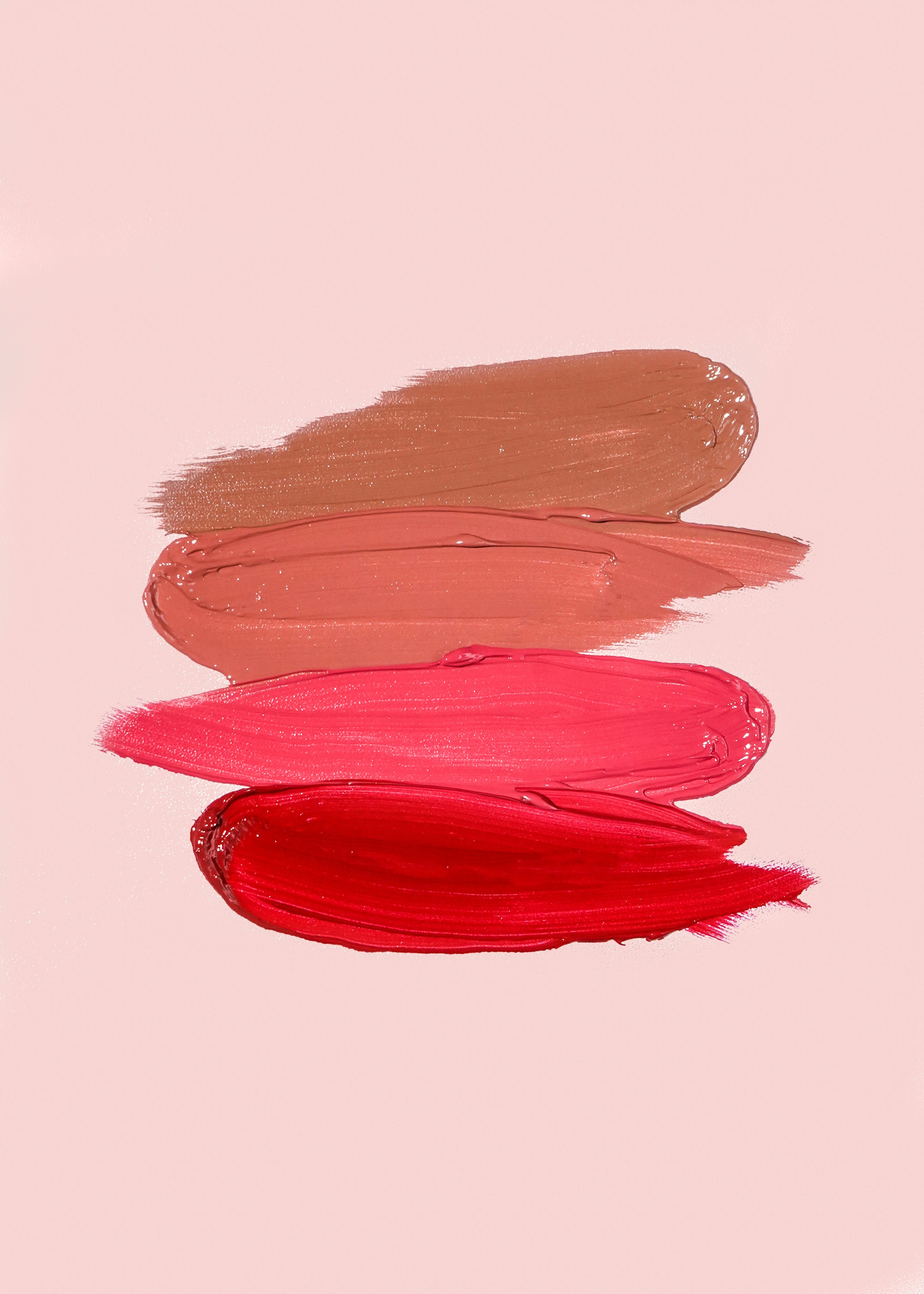 Lipstick shades in nude, coral, pink and red
